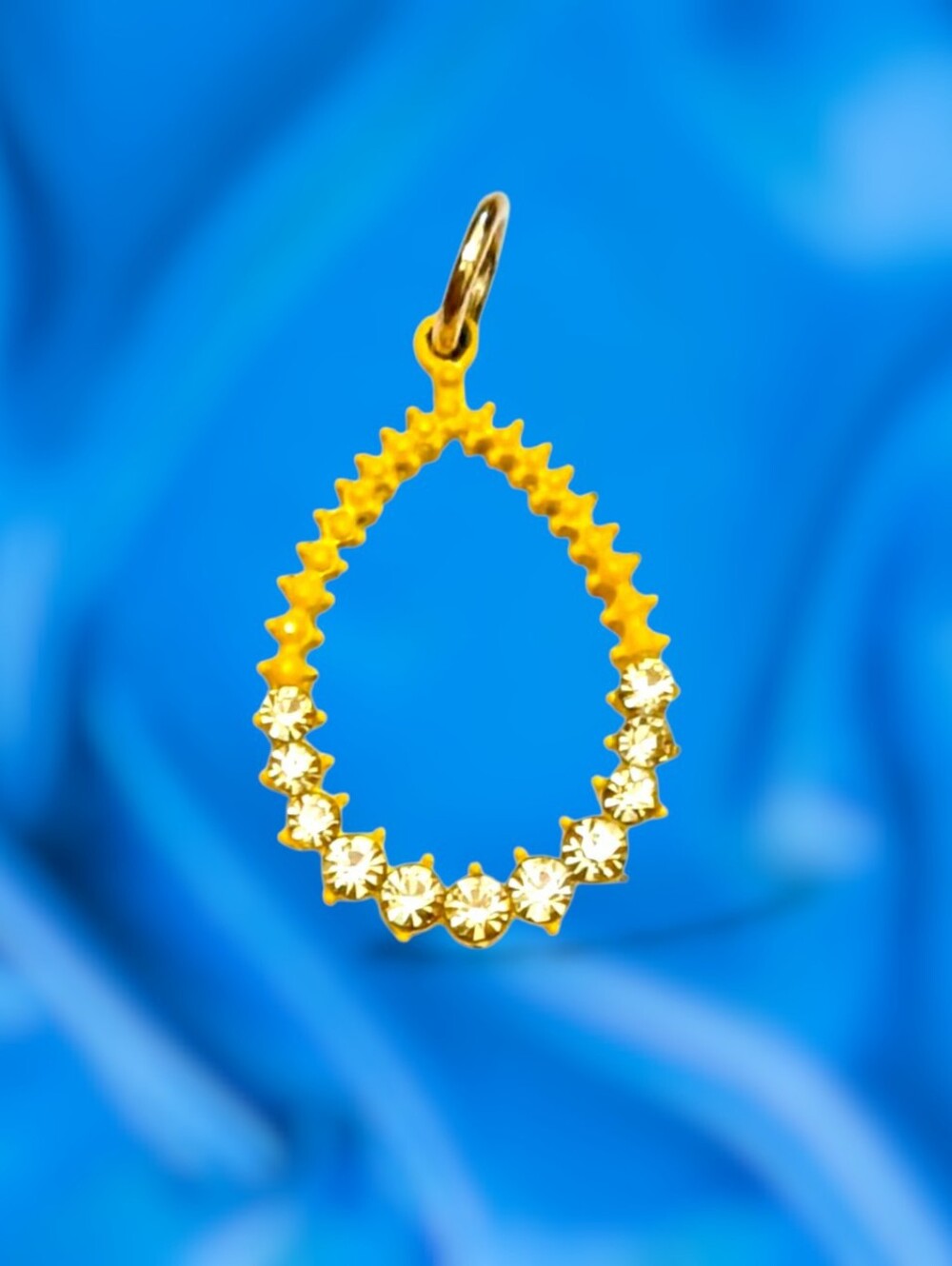 Yellow Jagged Edged Teardrop Pendant with Yellow-tone Crystals